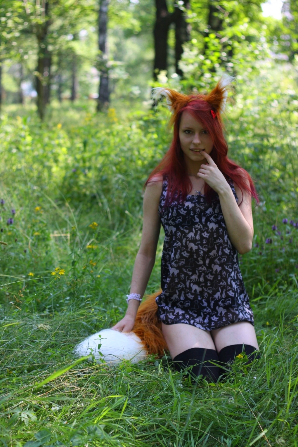 Девушка с хвостом лисы